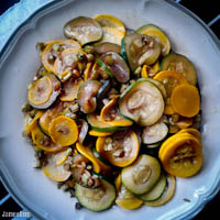 Green and yellow zucchini squash stir-fried with garlic, kale stems, soy and vinegar sauce